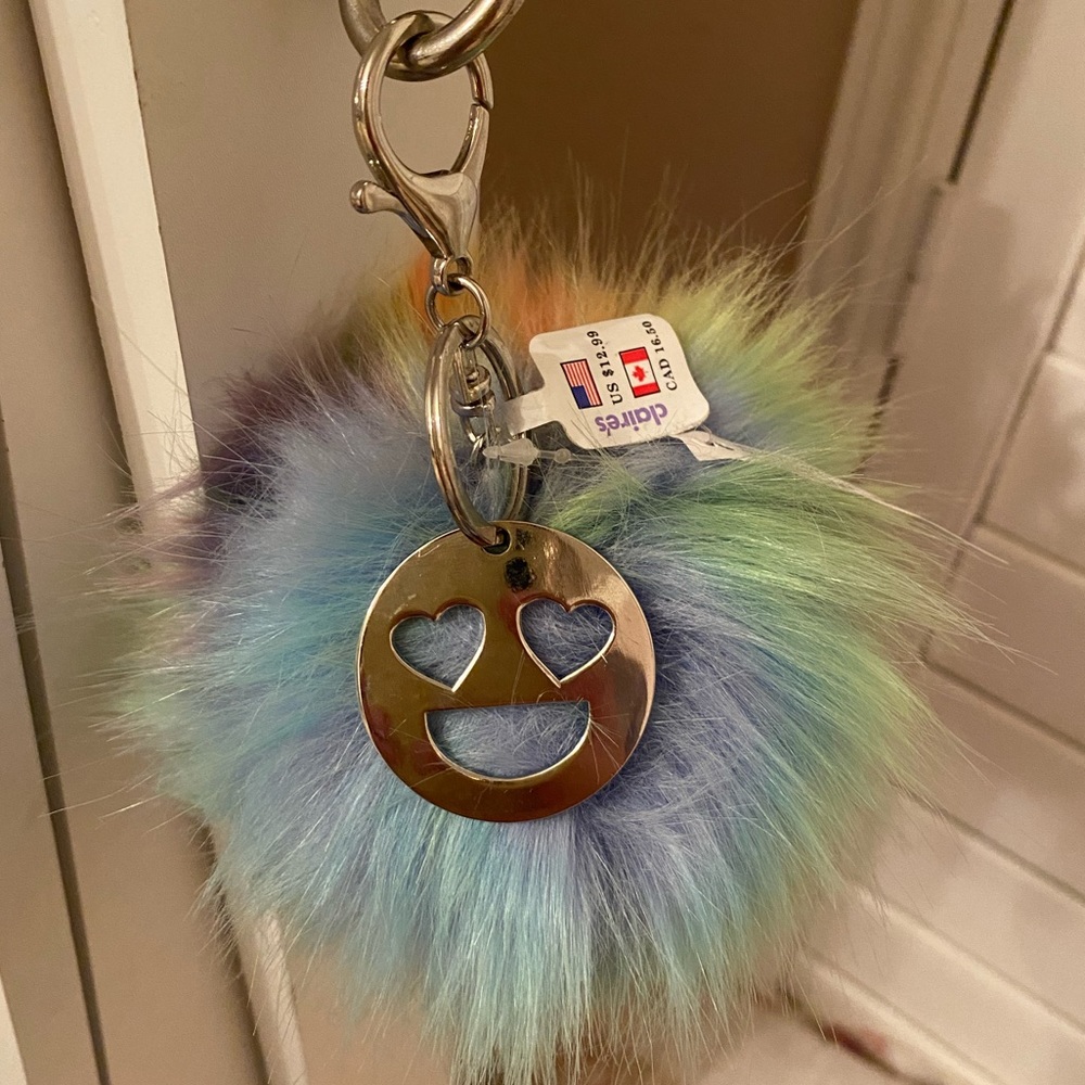 Pompom keychain with smiley face charm